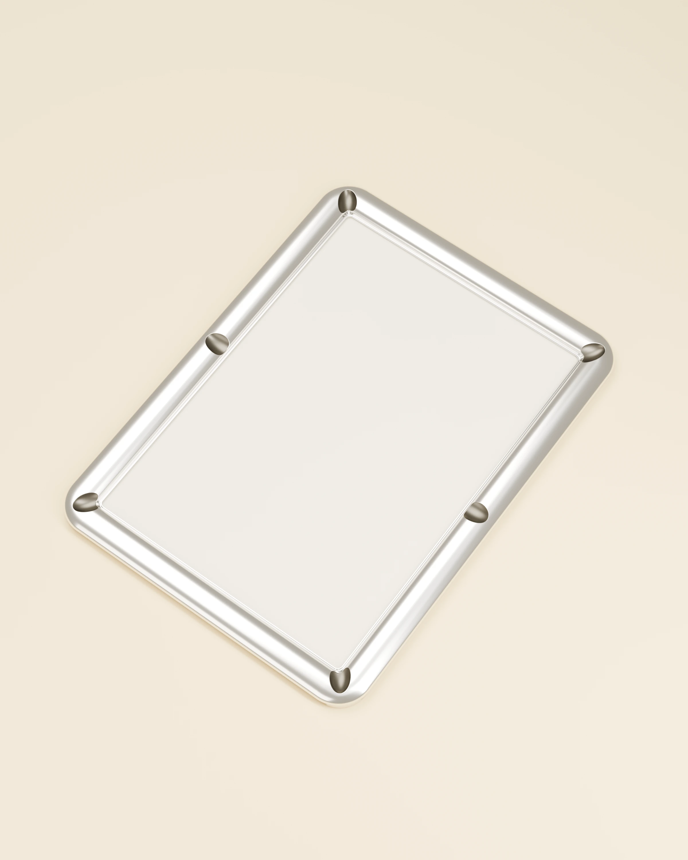 The Six in warm studio light, showing its rounded silver rails and six recessed pockets
